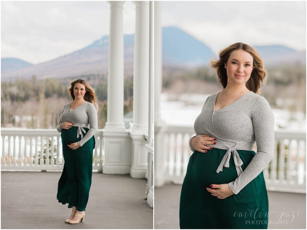 Pregnant woman holding baby belly in green skirt