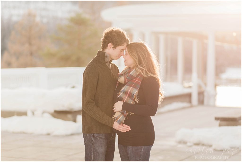 Pregnant woman and husband at winter maternity session