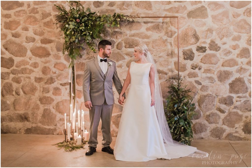 bride-and-groom-portrait-in-stone-barn-wedding-ceremony