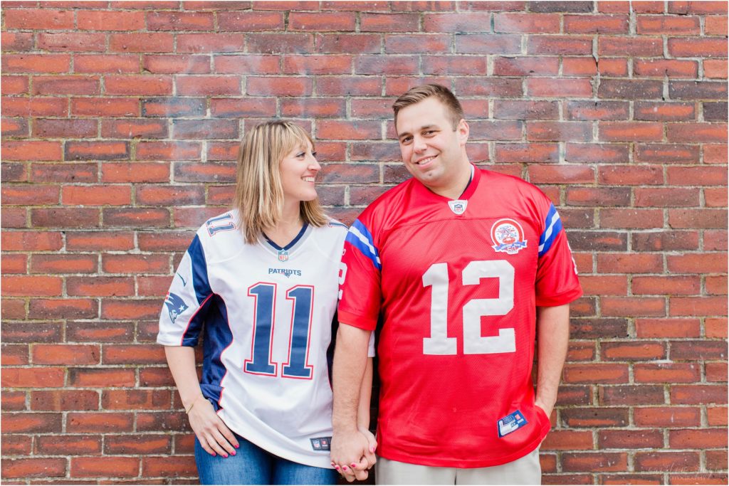 man and woman in football jerseys