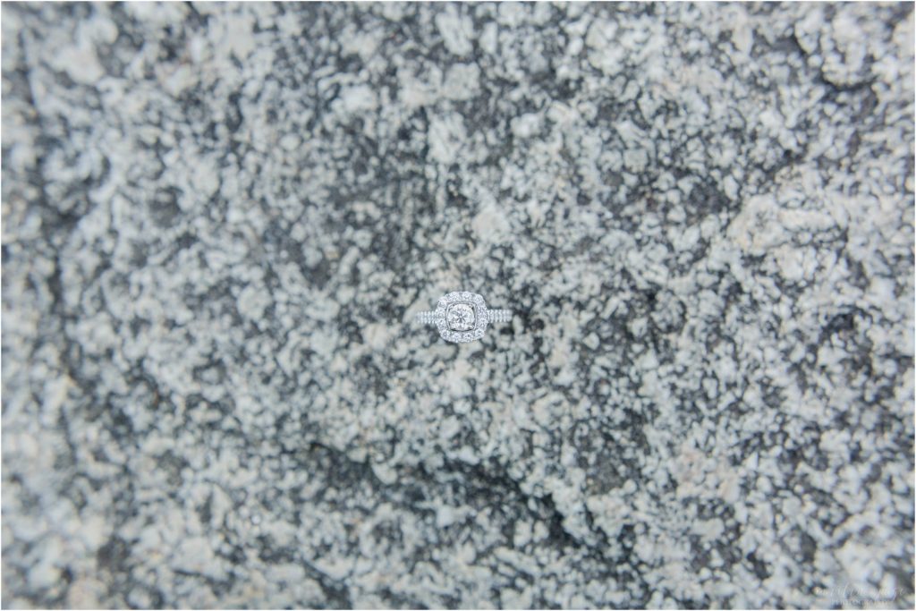 engagement ring on granite rock
