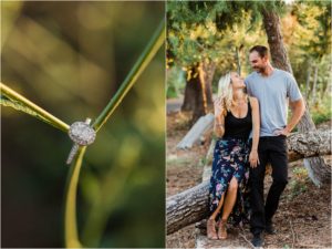 man and woman sitting on log engagement ring