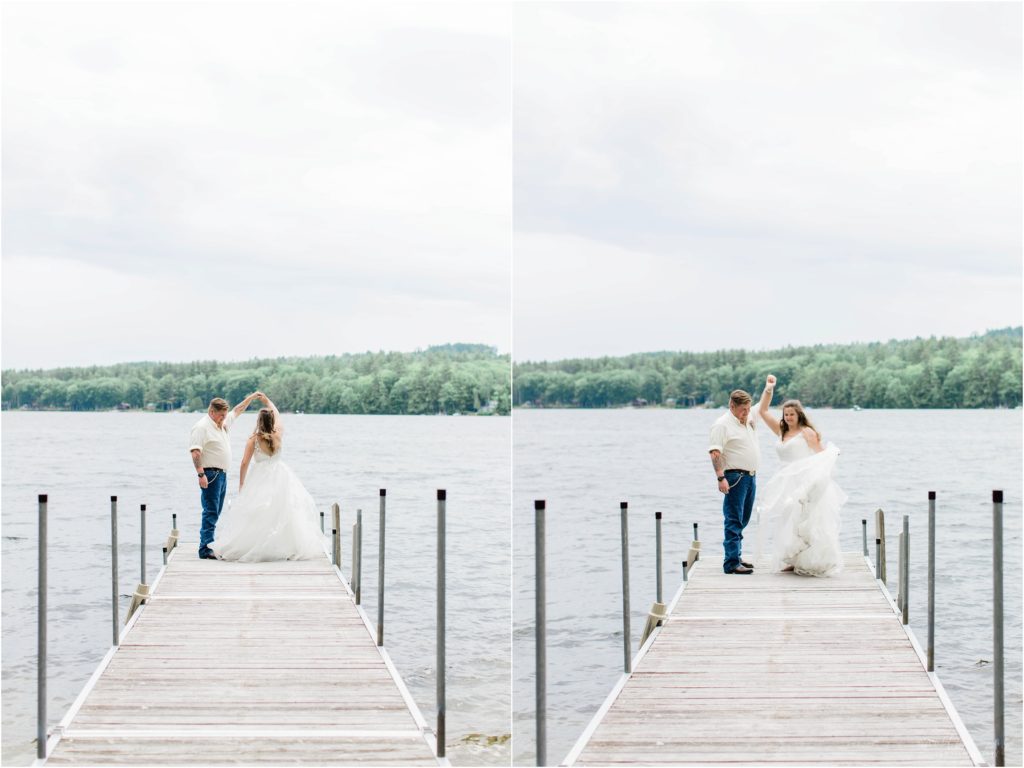 bride and groom twirling on dock