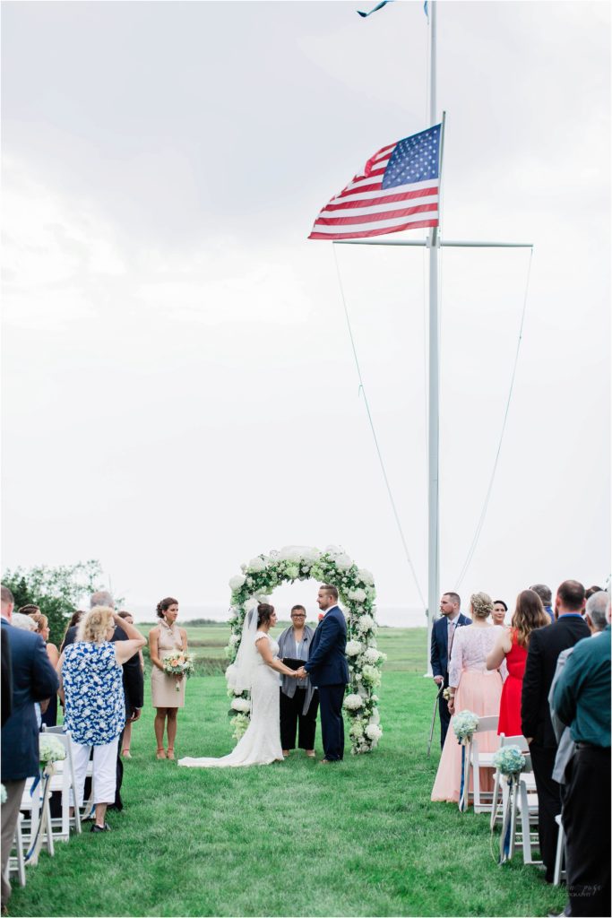 bride and groom at guilford yacht club wedding ceremony