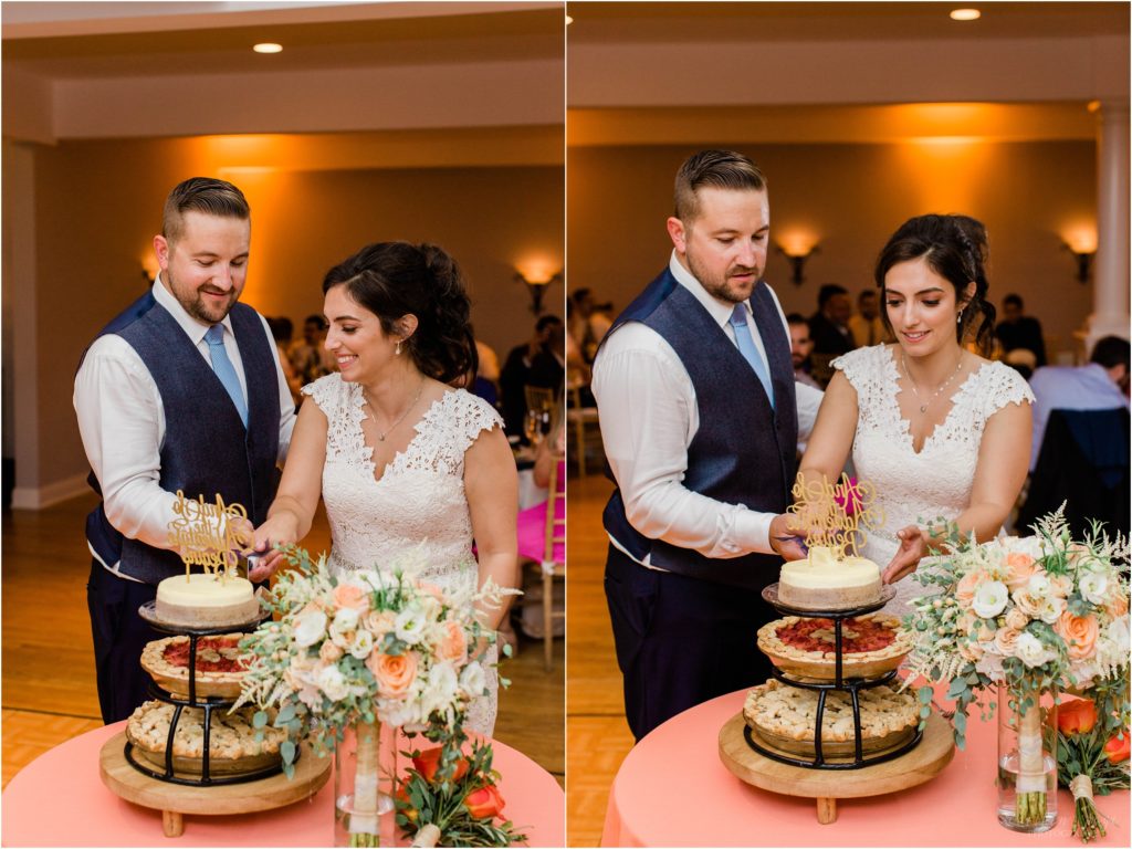 bride and groom cutting wedding cake guilford yacht club