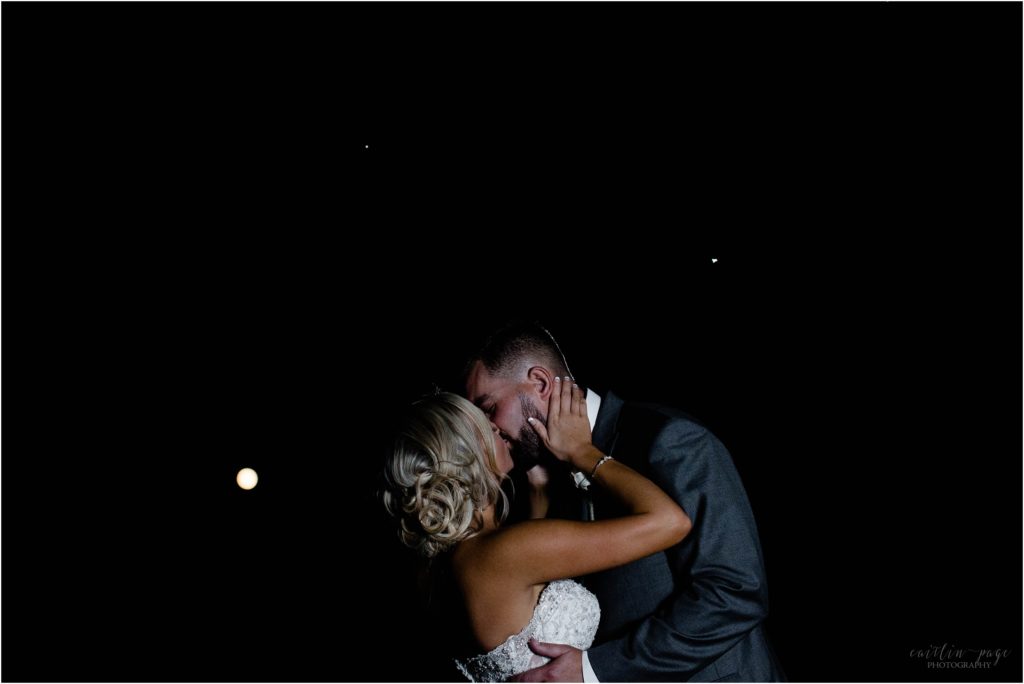 bride and groom night portrait with moon dell lea
