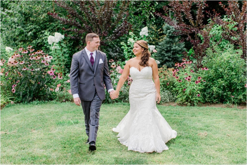 bride and groom walking at locke falls farm
