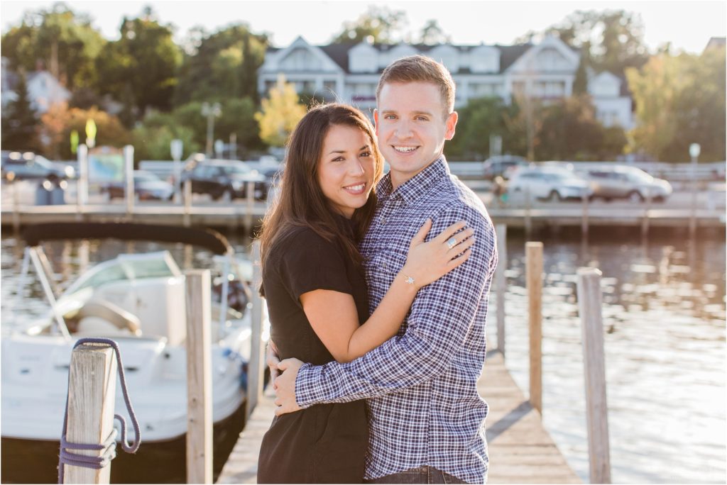 man and woman smiling at camera town docks meredith nh
