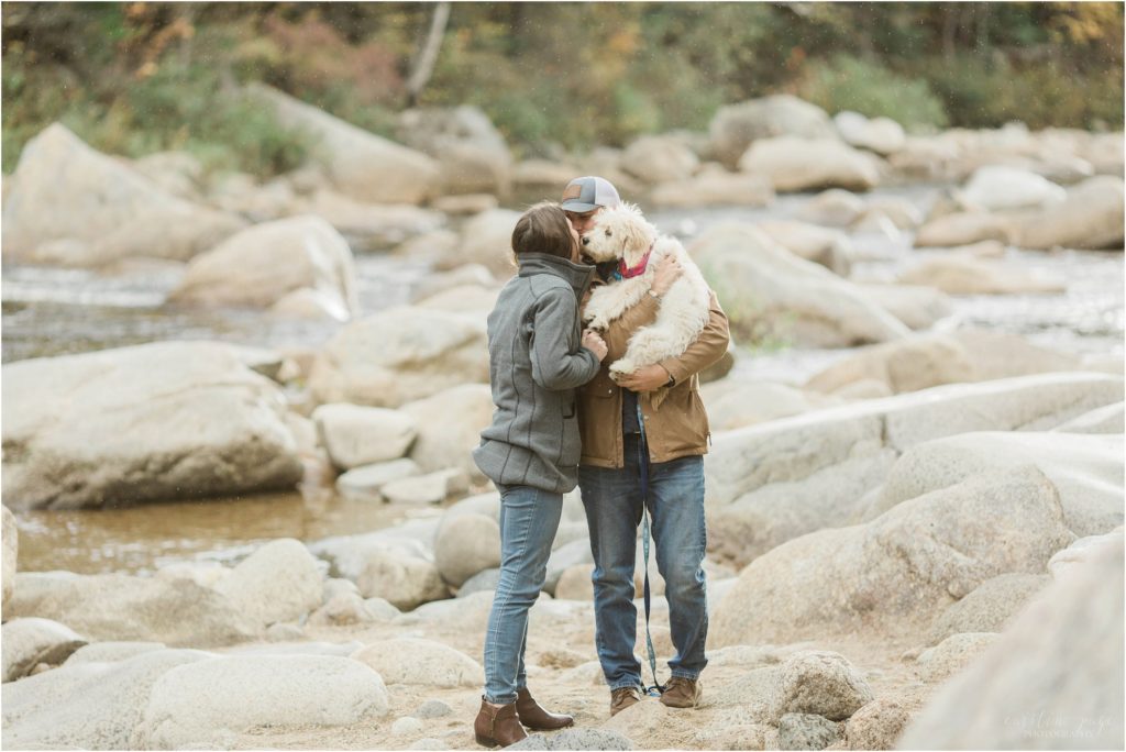 couple kissing with puppy lower falls white mountains