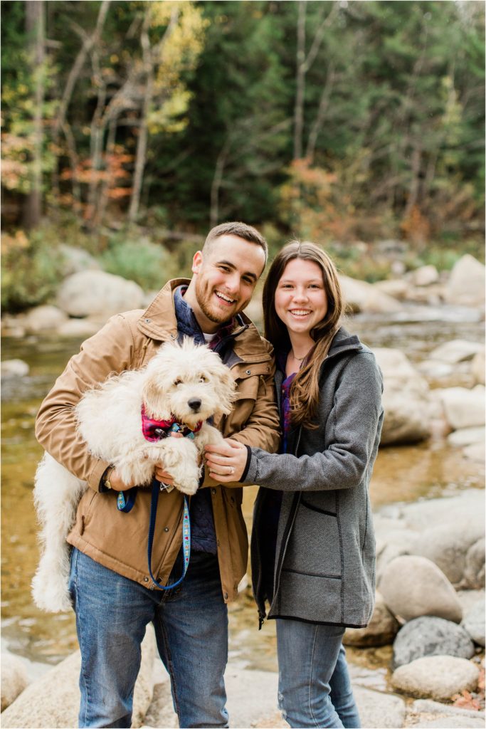 couple posing with puppy lower falls