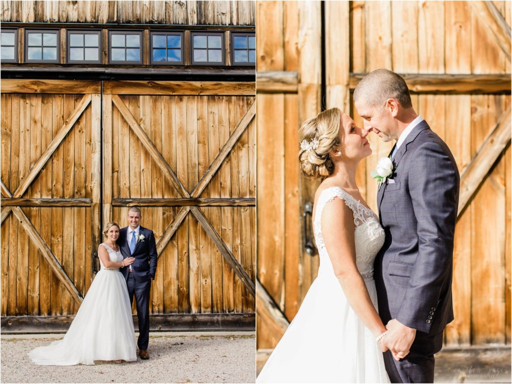 couple standing in front of barn kancamagus highway new hampshire