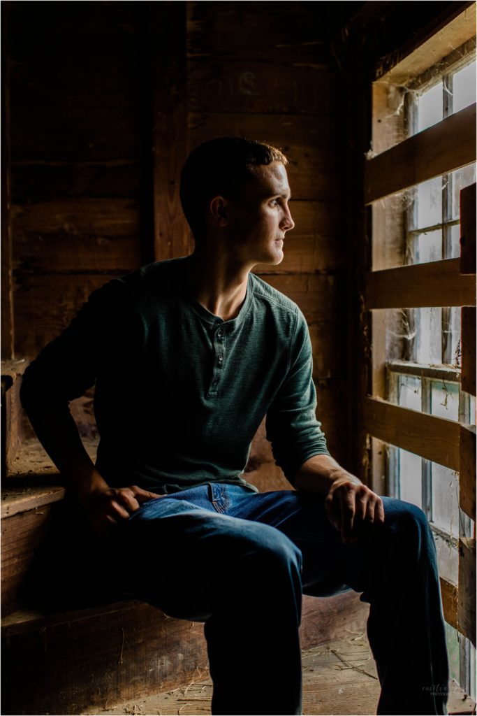 senior boy photo in barn