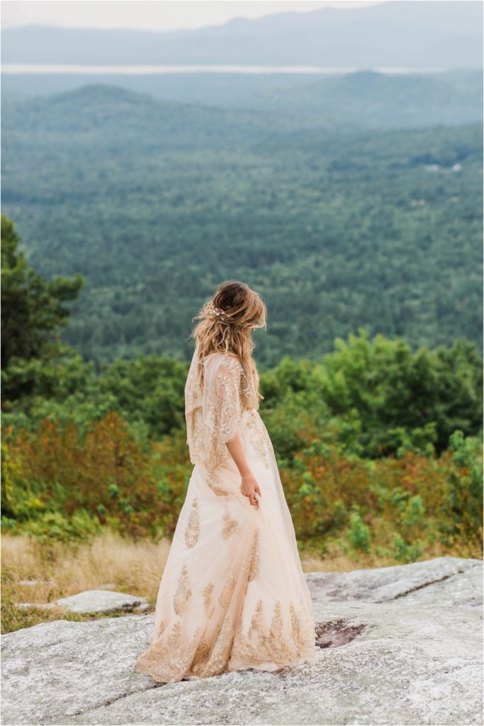 woman on top of Foss mountain fancy dress