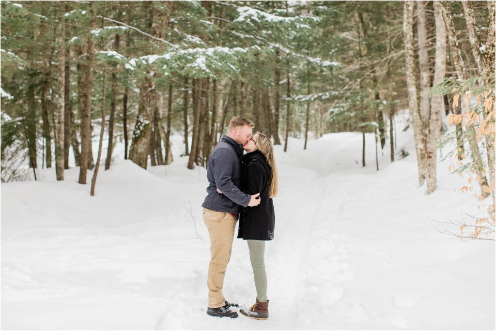 couple kissing snow sabbaday falls