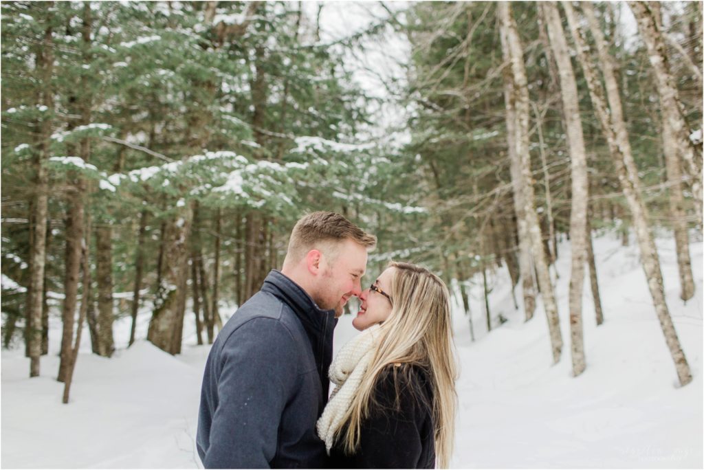 couple in woods snow