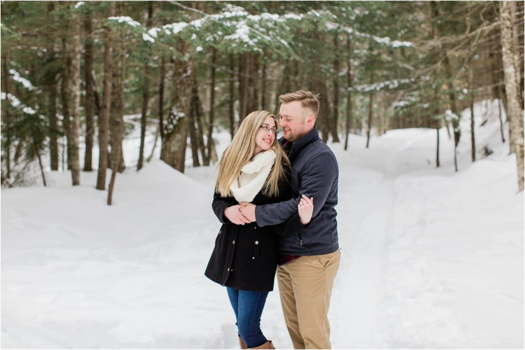 couple in snow falls