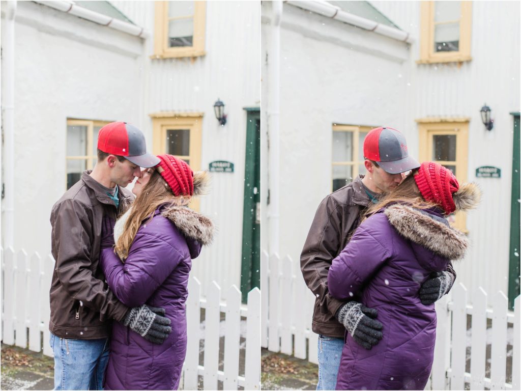couple kissing in snowstorm in iceland