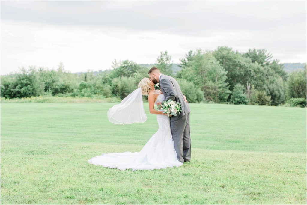 bride and groom kissing at dell lea new hampshire