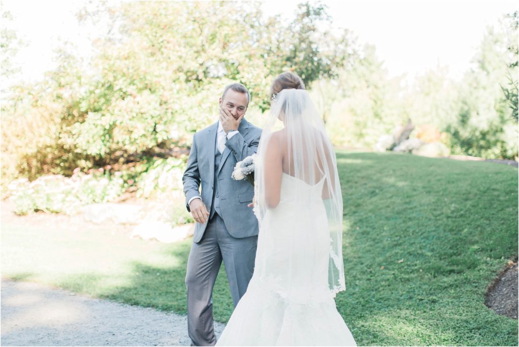 grooms reaction to bride on wedding day