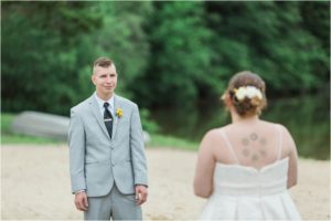 groom seeing bride at first look wedding day