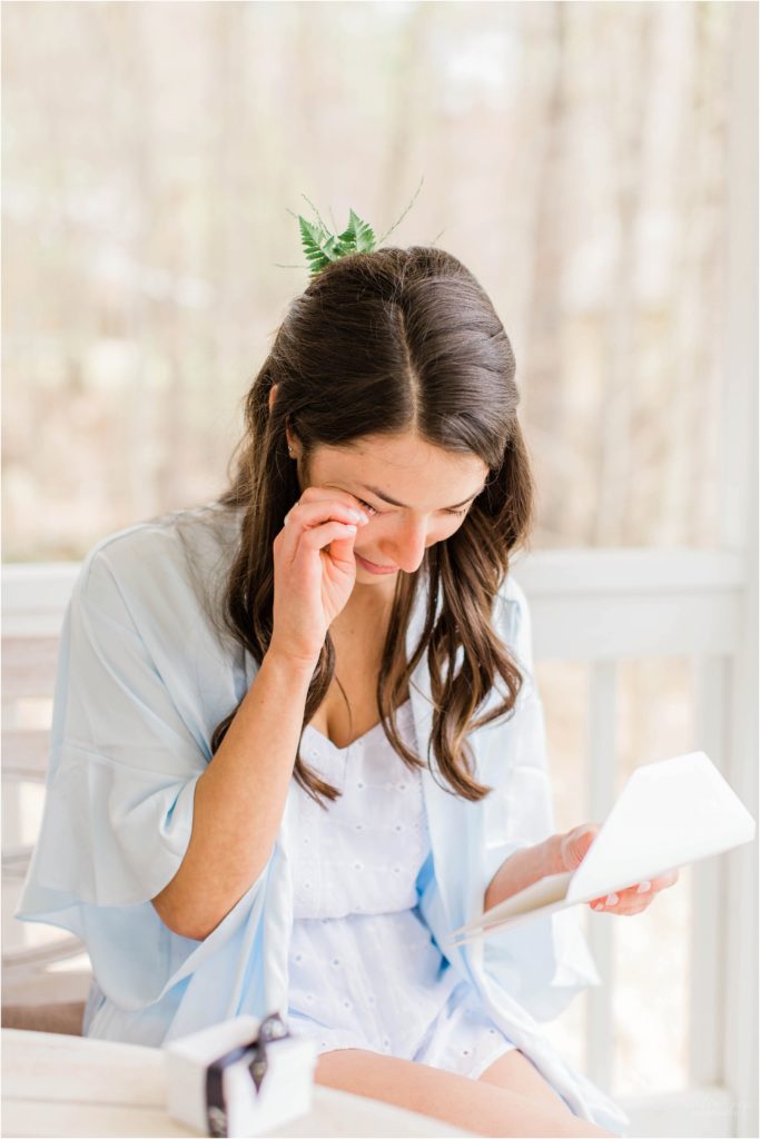 woman crying reading letter