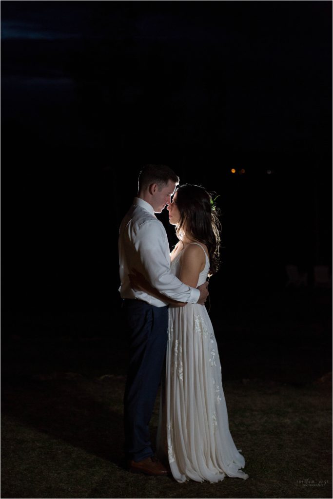 bride and groom portrait at night