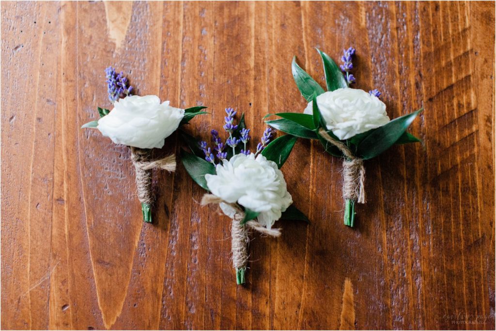 white boutonnieres with lavender 