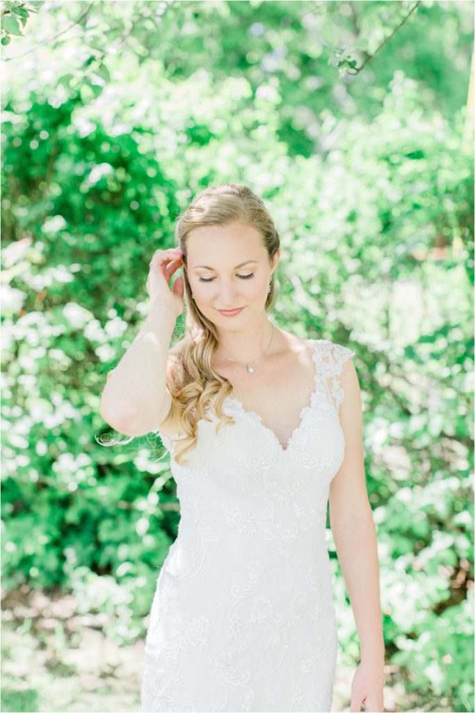 bride tucking hair behind her ears