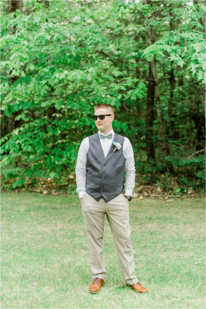 groom standing out in yard