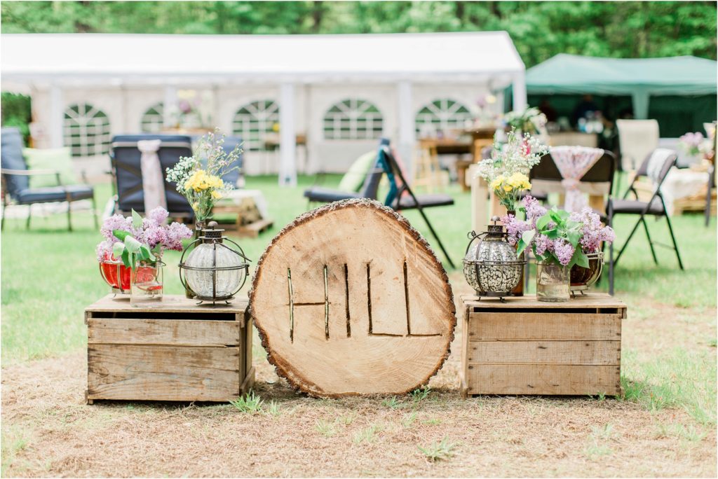 reception setup with name carved in log