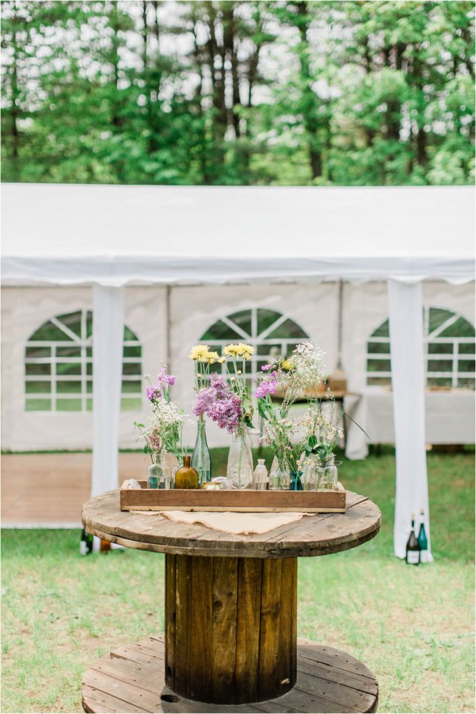 large spool table with flowers