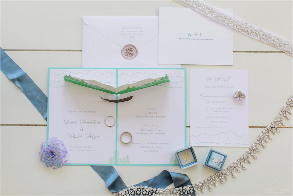 Pop up wedding invitation styled with invitation suite and wedding jewelry