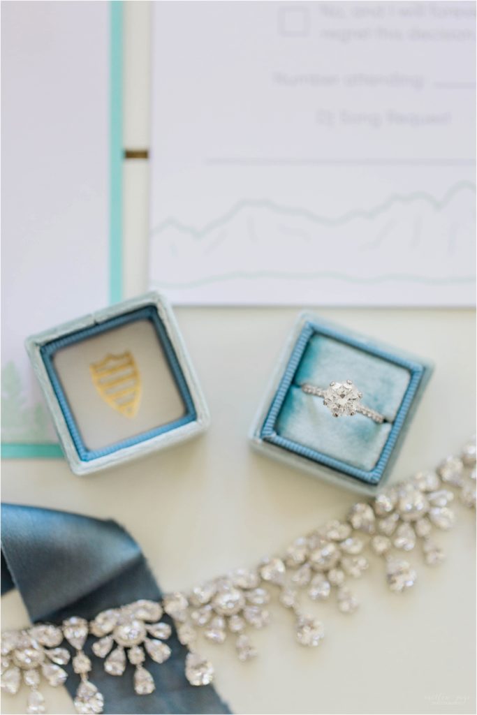 Engagement ring in a Mrs. Box with wedding necklace