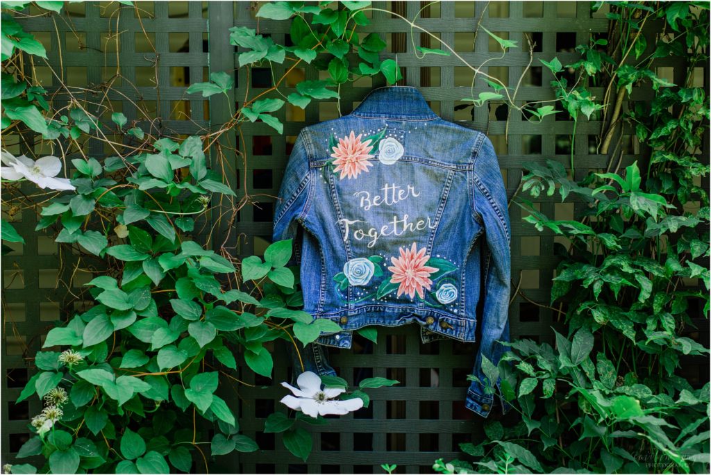 Hand painted jean jacket hanging