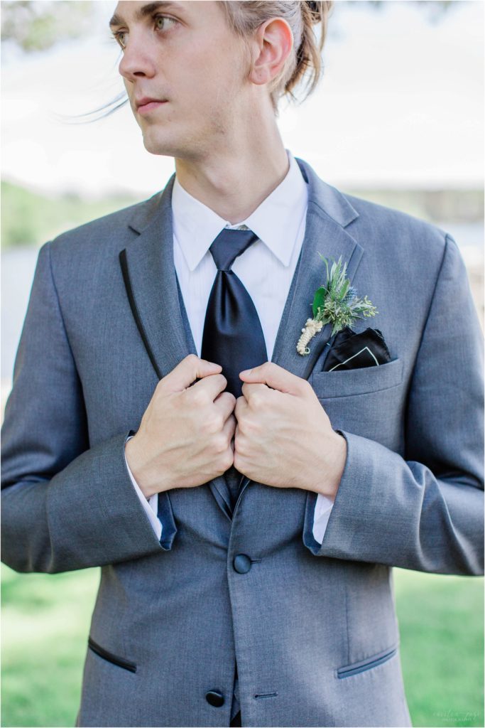 groom in gray suit