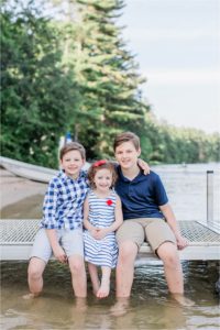 Kids sitting on dock