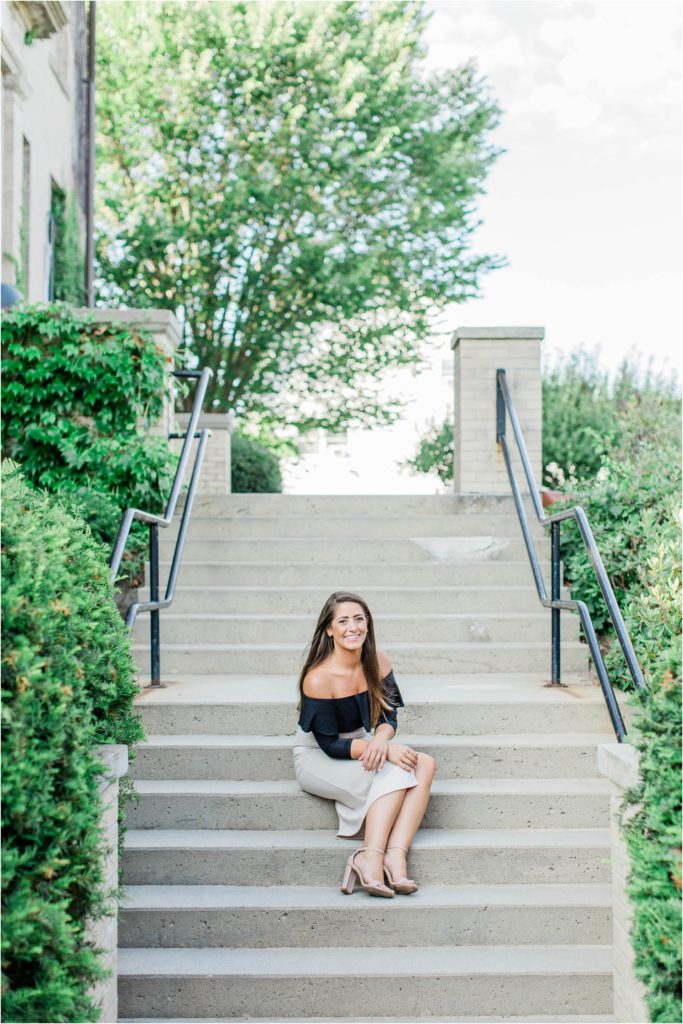 Woman sitting on steps at Brewster Academy