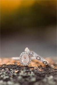 Oval engagement ring with halo and wedding band