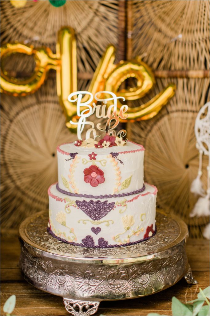 Boho cake with bride to be topper summer bridal shower inspiration