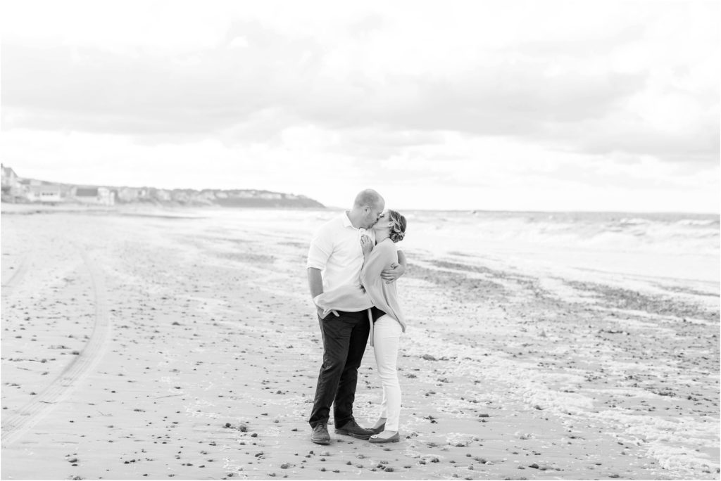 black and white photo of couple on white horse beach plymouth massachusetts