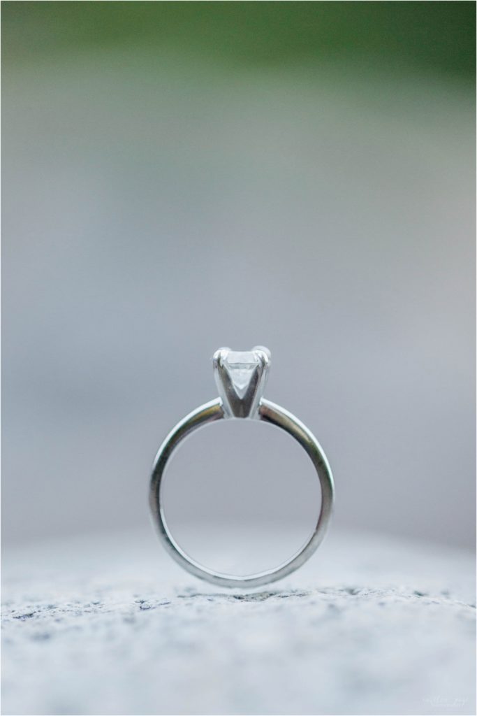 solitaire engagement ring on granite