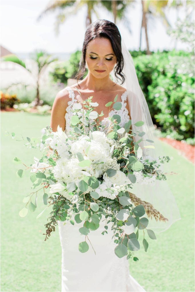 textured asymmetrical bouquet with greens and white flowers