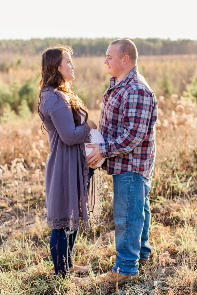 Man and pregnant wife looking at each other