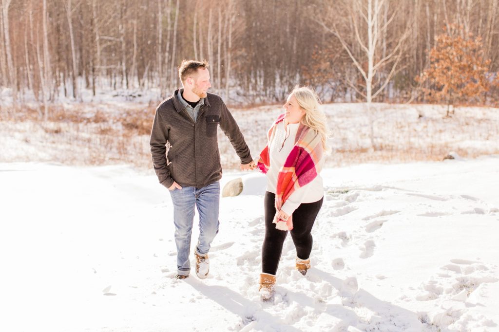 Couple walking together in the snow