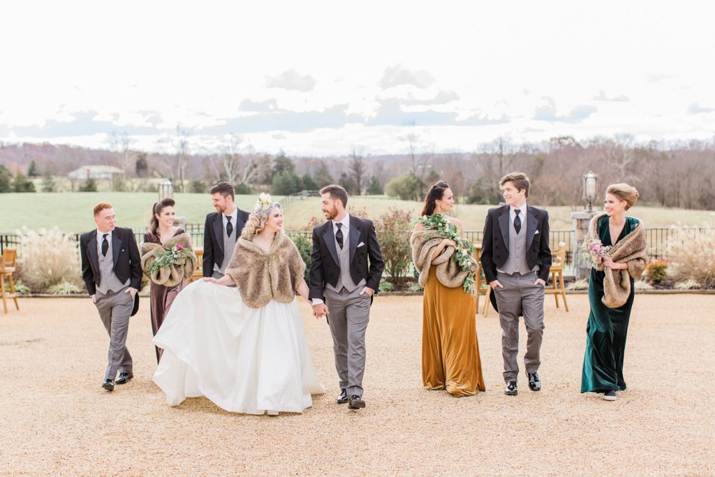 Vintage styled bridal party walking at Mount Ida Farm in Charlottesville Virginia