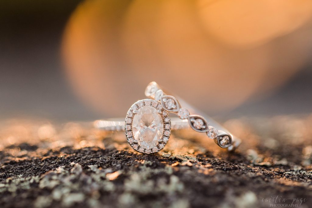 Wedding rings sitting on granite rock