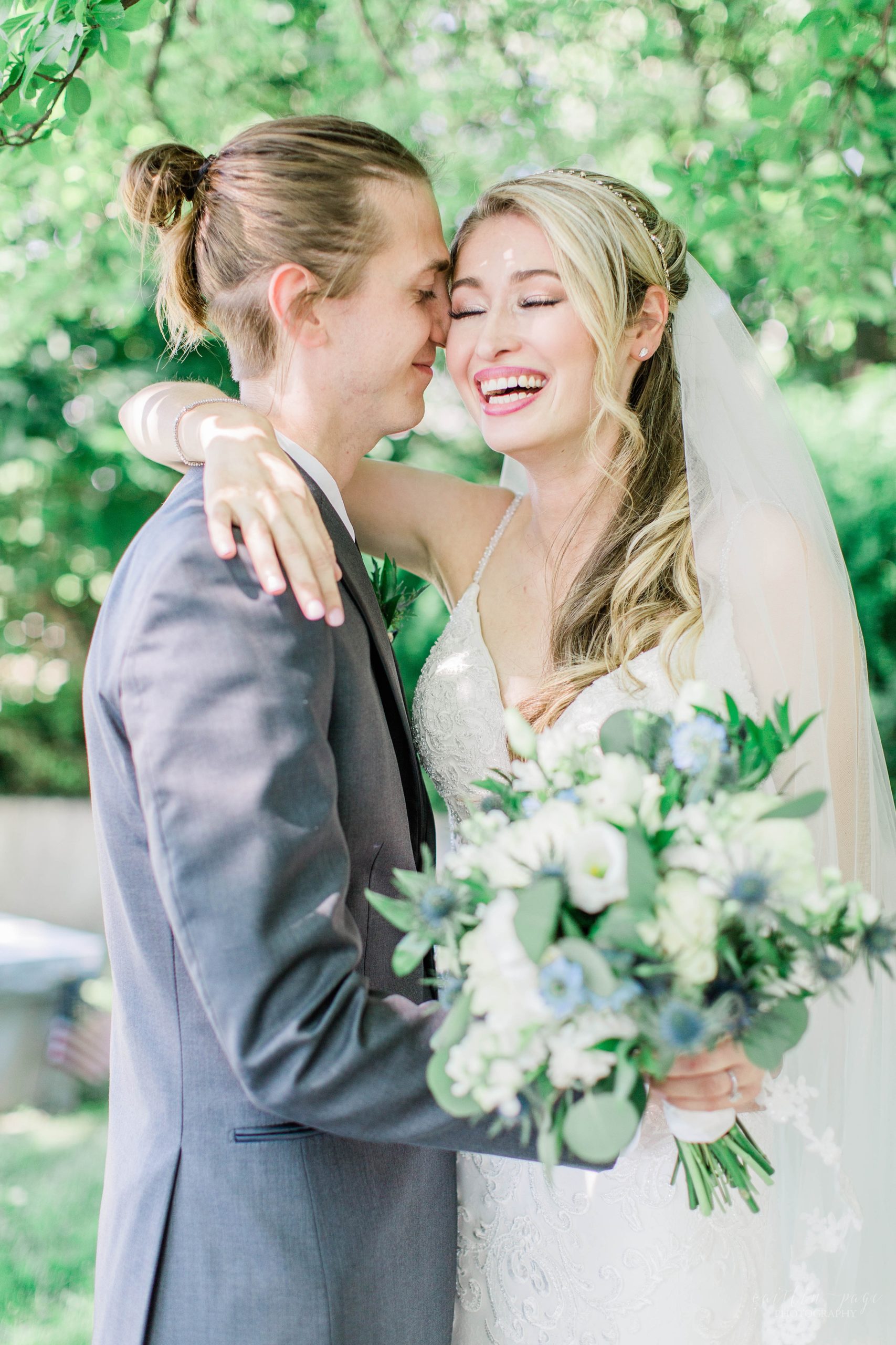 Woman laughing in a wedding dress