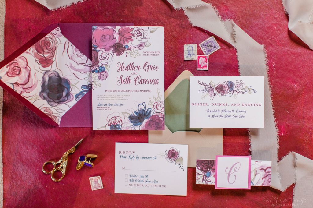 Invitation suite styled with cranberry and navy at Mount Ida Farm in Charlottesville Virginia