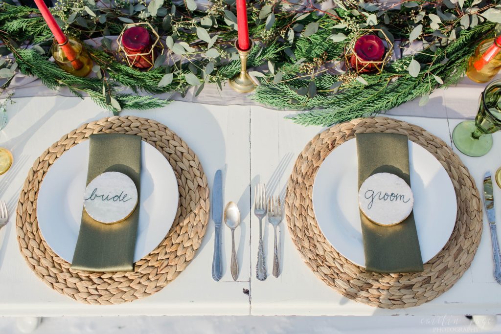 Styled wedding reception table details with marble name tags