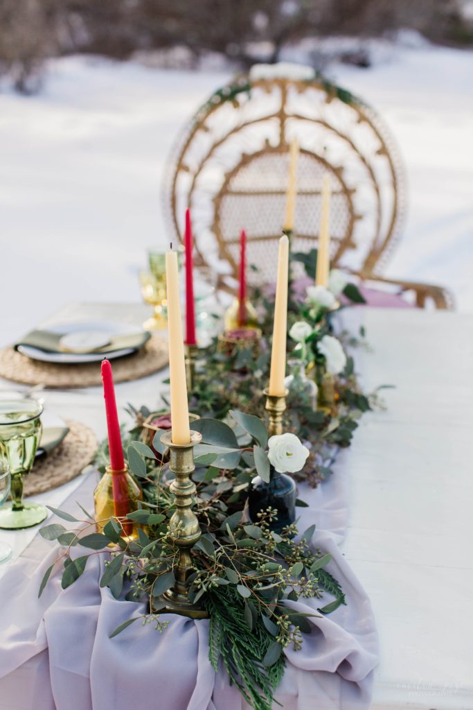 Styled wedding reception table on frozen lake